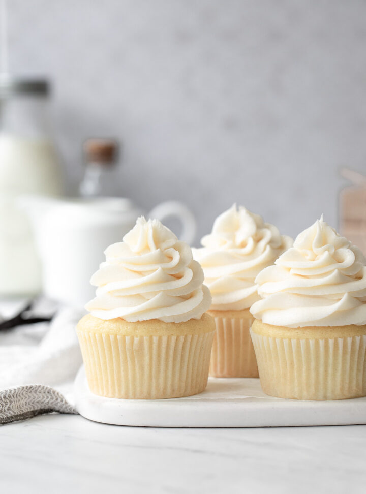Vanilla Cupcakes with Buttercream Frosting on a white marble plate