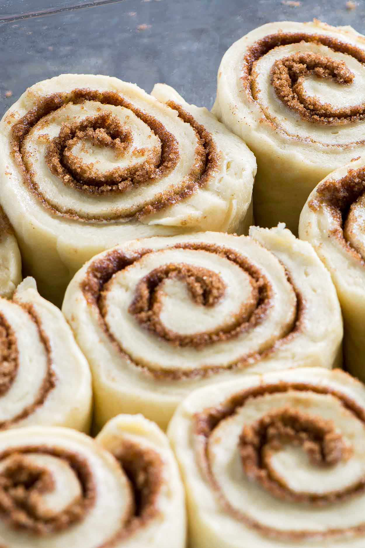 Made from scratch jumbo cinnamon rolls that are light and flaky. Filled with brown sugar, cinnamon and topped with a generous layer of cream cheese icing. | simplerevisions.com
