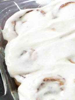 Made from scratch jumbo cinnamon rolls that are light and flaky. Filled with brown sugar, cinnamon and topped with a generous layer of cream cheese icing. | simplerevisions.com