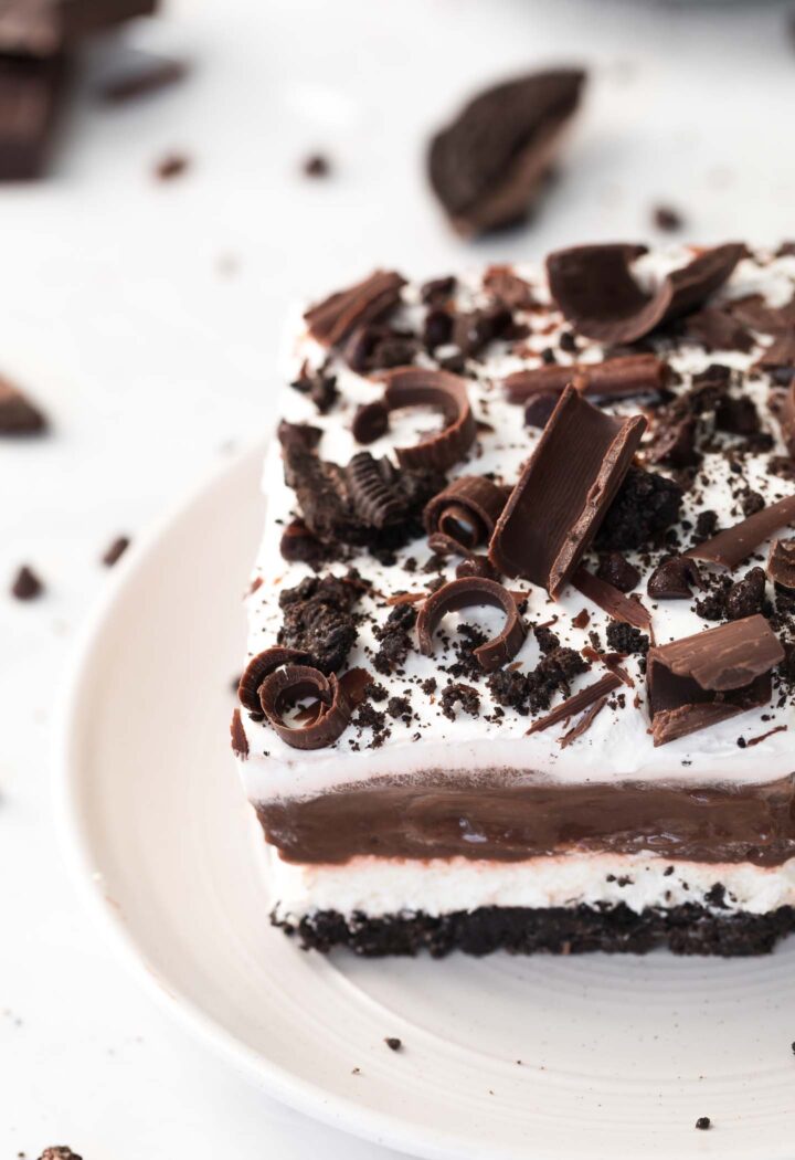 A slice of chocolate lasagna on a white plate.