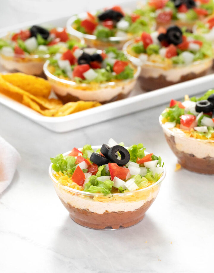 7 Layer Dip Cups on a plate